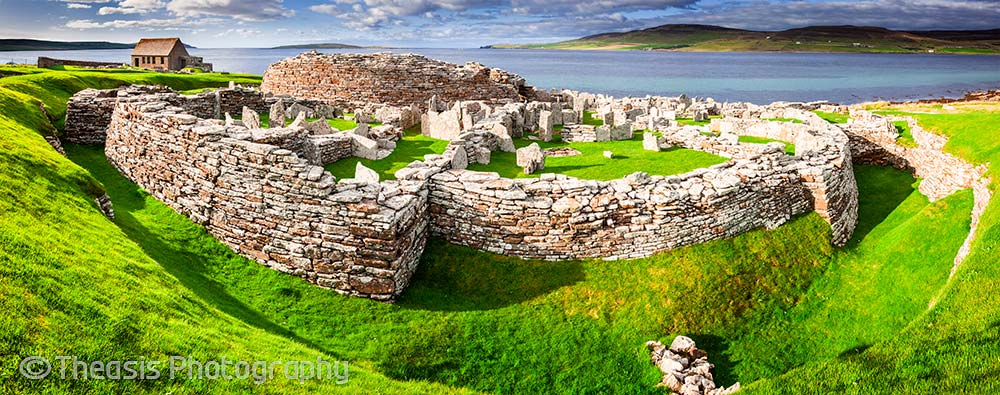 Panoramic view showing the ditch around the broch and village.
