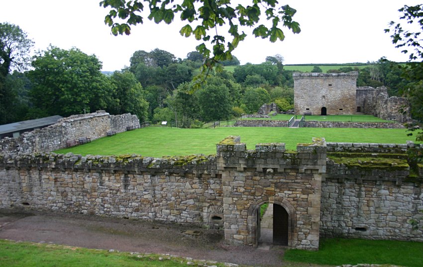 The front curtain wall, gatehouse and 16th century tower keep from the west.