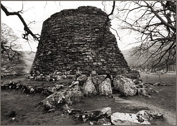  The exterior of the broch showing the surrounding wall