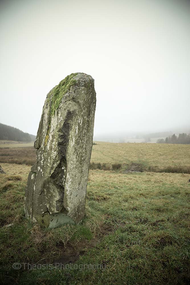 One of the two taller stones.