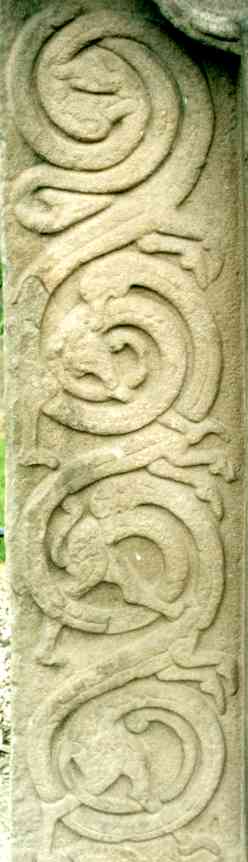 Detail of the interlaced creatures at the left of the cross side.