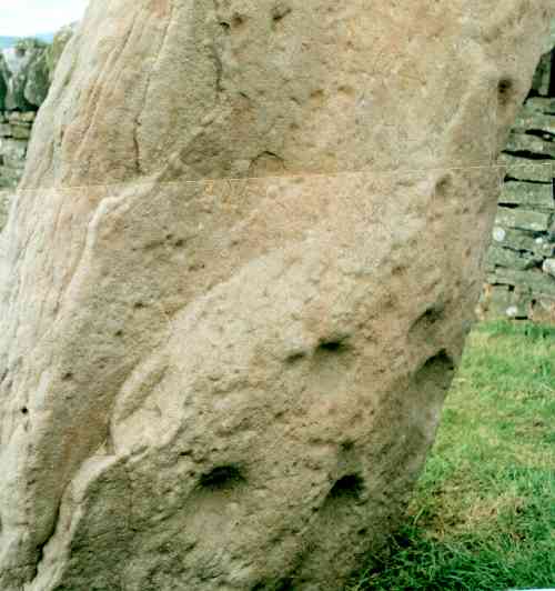 Cup marks on the back of the Serpent Stone.