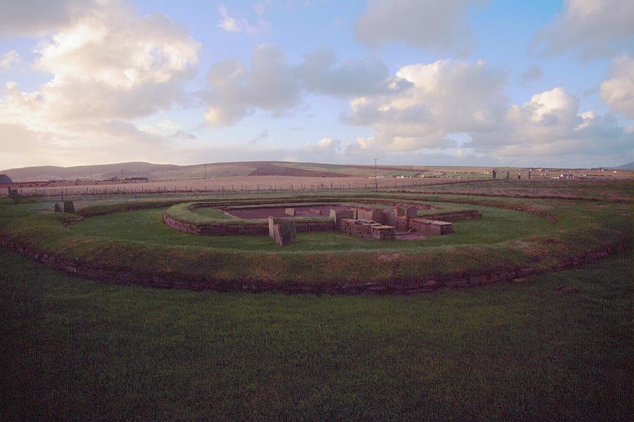 Structure 8.  The stones of Stenness can be seen in the distanceto the right of the building.