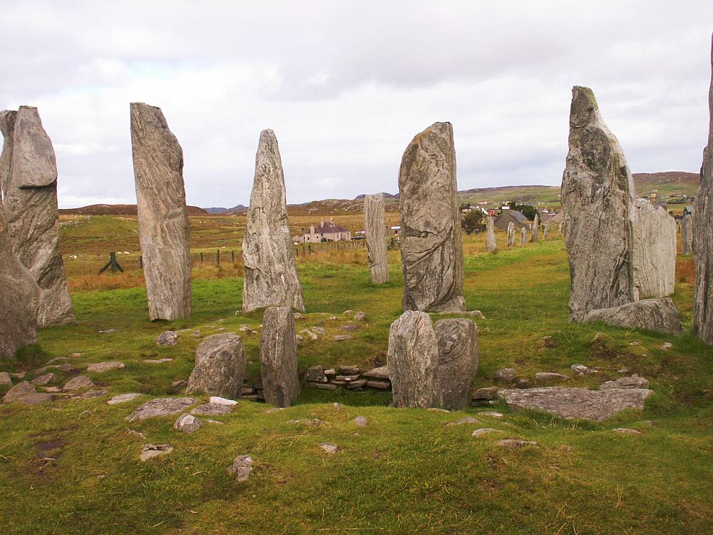 The central chambered cairn and stone circle from the south.
