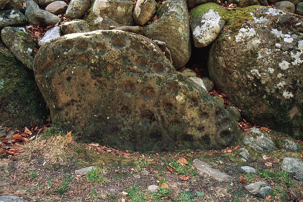 Decorated kerb stone in the northeast passage cairn.