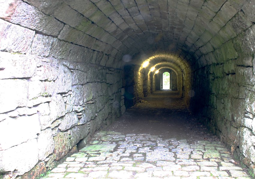 Vaulted corridor under the keep tower leading to the cellar vaults.