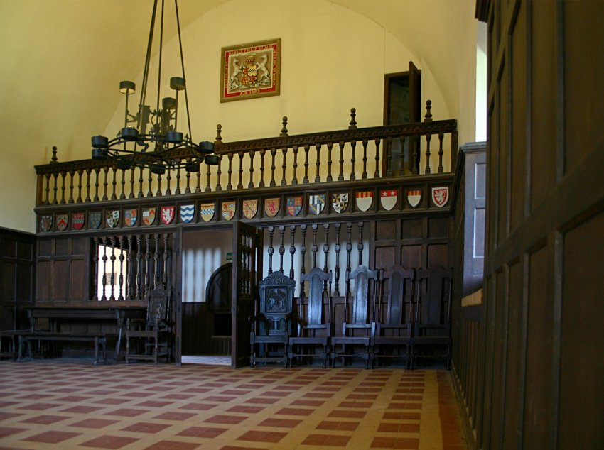 The west end of the lord's hall with the musician's gallery above the screens passage.
