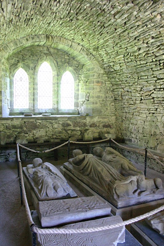 The inside of the chapter house - later to be a mausoleum. Lying on the left is the effigy of a Stewart knight.  On the right is the double effigy of Earl Walter Stewart (who died around 1295) and his countess.