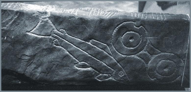 Inchyra: The double disc and salmon.  An ogam inscription is visible on the top edge.
