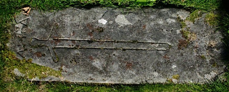 Grave slab in the graveyard.