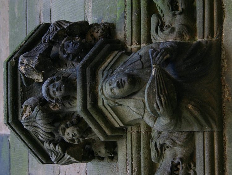 Carvings in the great hall in the east range.