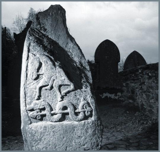 The "Pictish symbol side" of the slab in Logierait churchyard.
