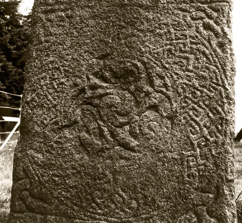 Detail of the spiral and knot-work panel at the base of the west face.
