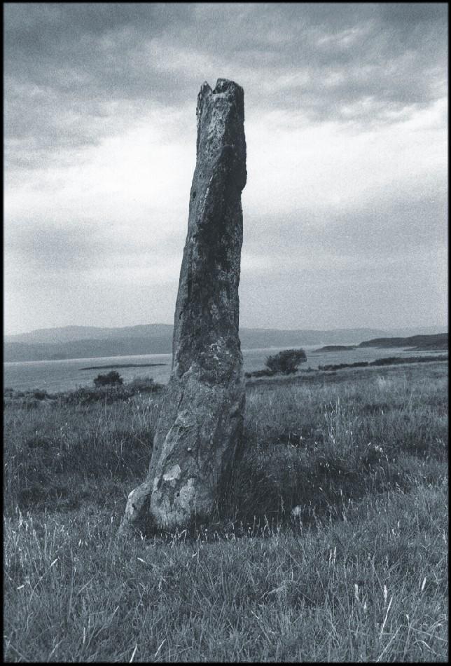 The tallest of the pair of stones, looking northwest over Loch Fyne to the Knapdale Peninsula.