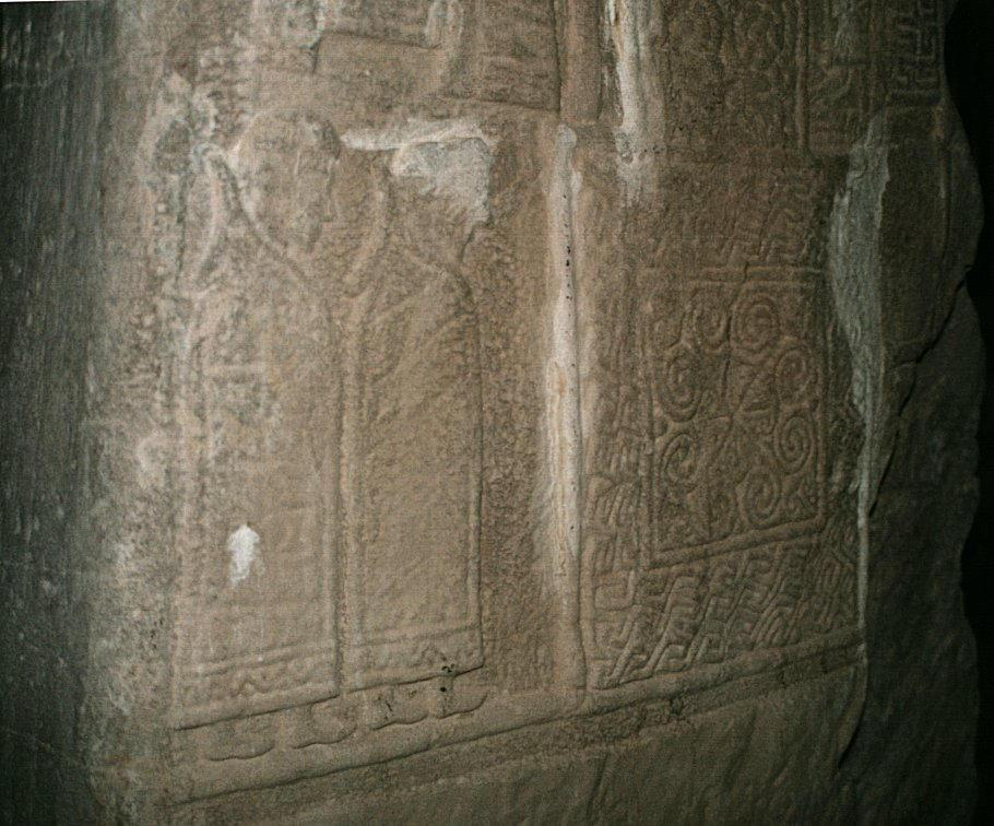 Detail of the base of the cross. The blokes in anoraks are believed to be Pictish computer geeks.